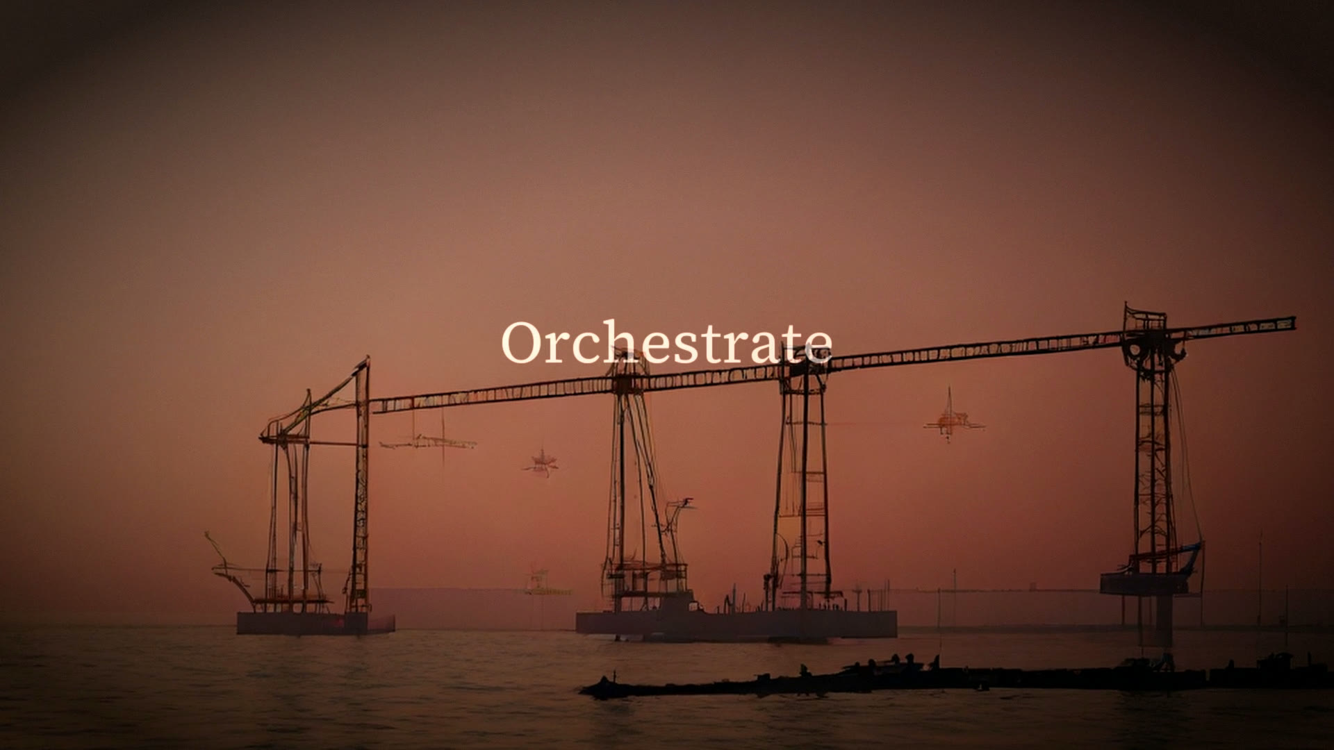 The word Orchestrate over cranes at dusk.
